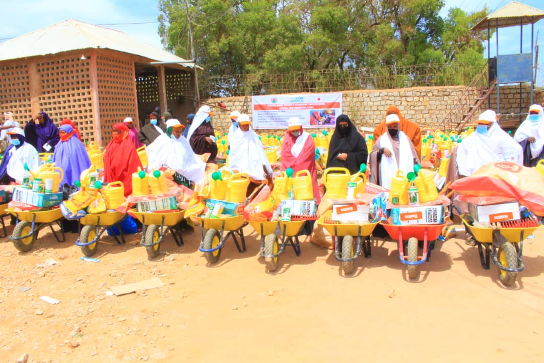 Women receiving the farming tools and seeds in Baidoa