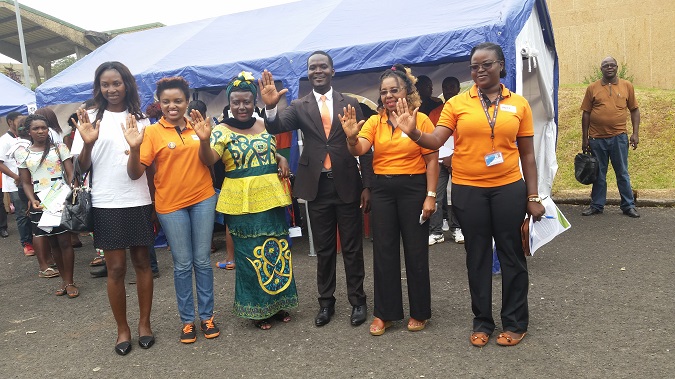 Vice Chancellor (second from left in orange), Regional Delegate of Women’s empowerment and the family (fourth from left) and UN staff say “NO” to violence against women in Cameroon. Photo credit: UN Women