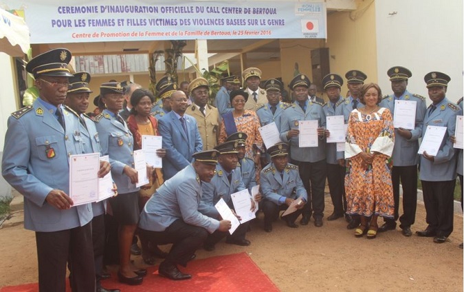 Minister, Ambassador of Japan and UN Women Representative flanked by Police officers during award of attestation after training on protecting women and children during humanitarian crises. Photo credit: J Fajong/UN Women