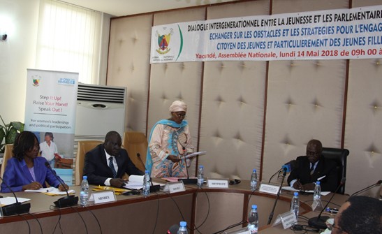 Minister Marie-Therese Abena, Minister of Women Empowerment and the Family delivering her speech during the event flanged by Minister of Youth Affairs and Civic Education, Mounouna Foutsou (left) and Hon Etong, 1st Vice President of the National Assembly. Pjoto credit, Teclaire Same, UN Women Cameroon.