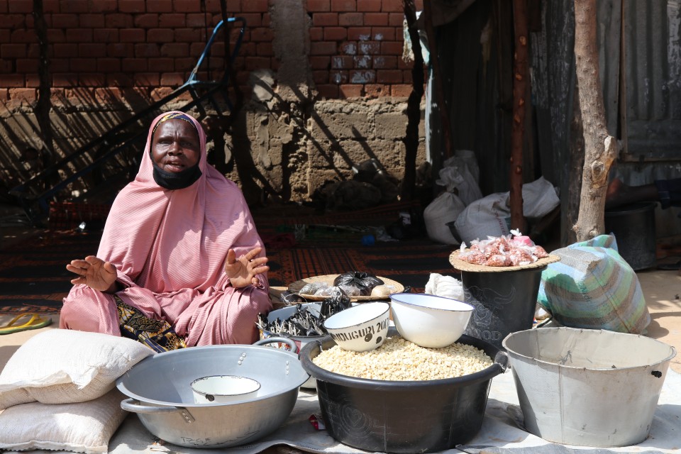 Lariba Sule selling her food items at teachers' village, IDP camp in Maiduguri, Borno state. Photo credits: UN Women/Marian Roberts.