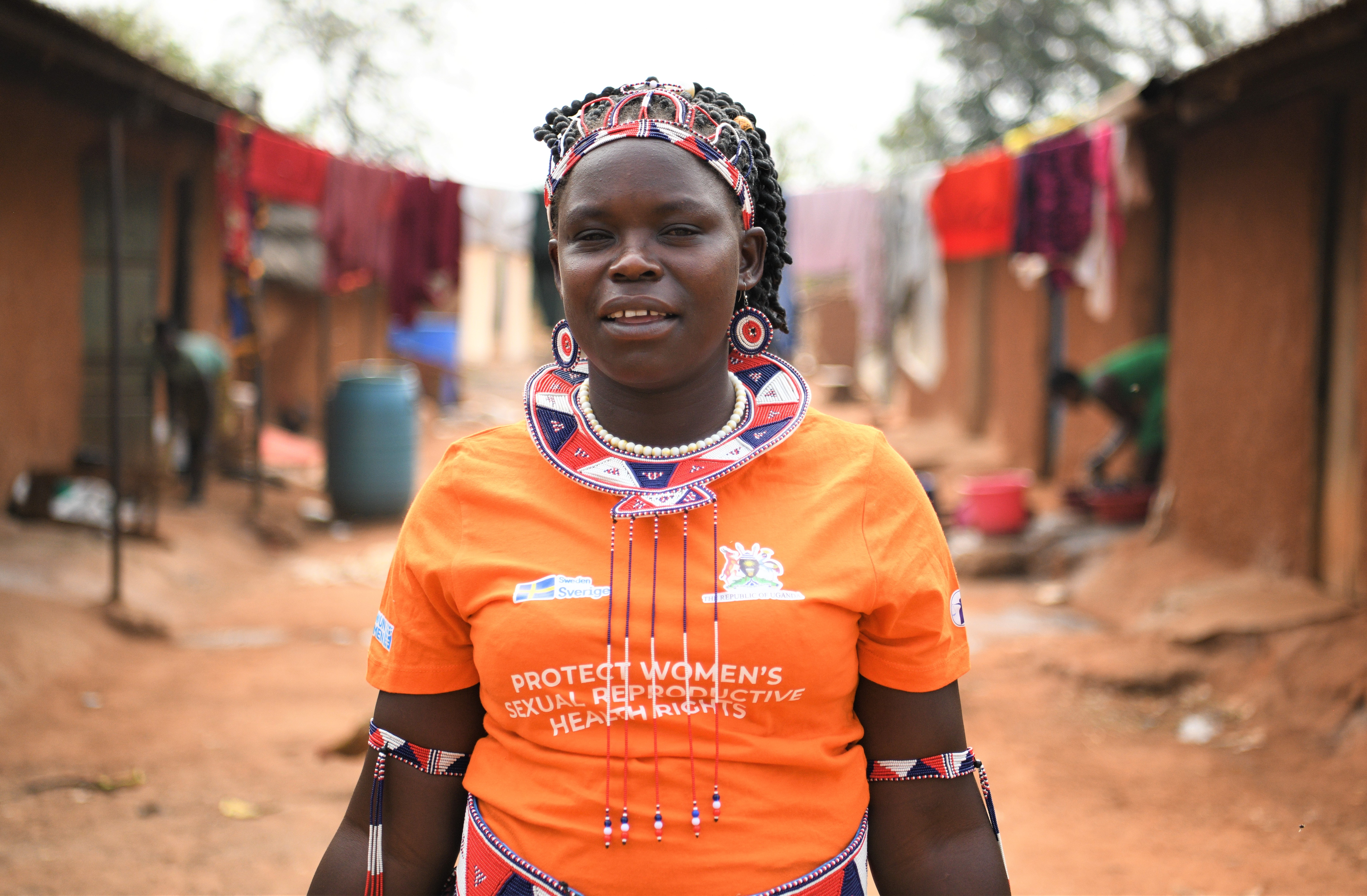 Martha Akol poses outside her homestead in Lorengenchero Sub County, Napak in Karamoja Region. Martha is a beneficiary of legal aid services support from FIDA Uganda supported by UN Women through the Embassy of Sweden (Eva Sibanda/UN Women)