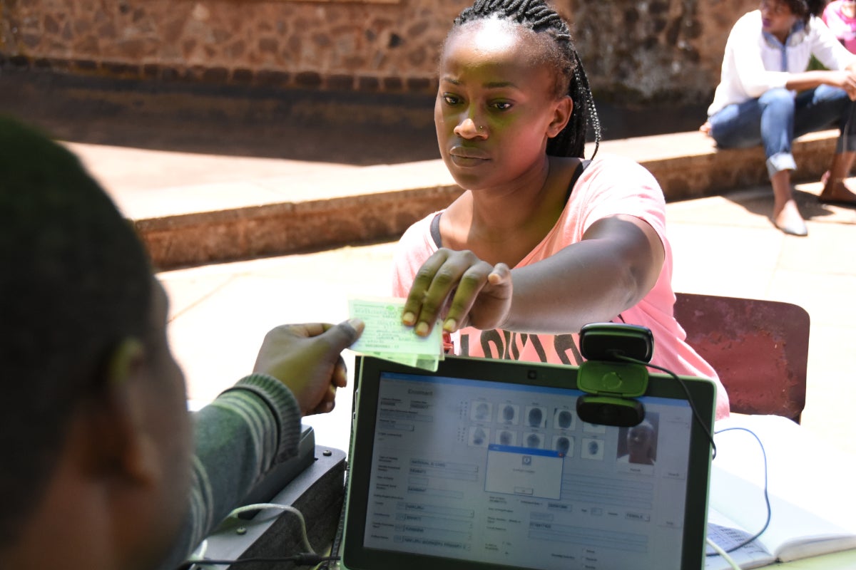 A voter registering details with Kenya’s Independent Electoral and Boundaries Commission (IEBC) ahead of the election. 