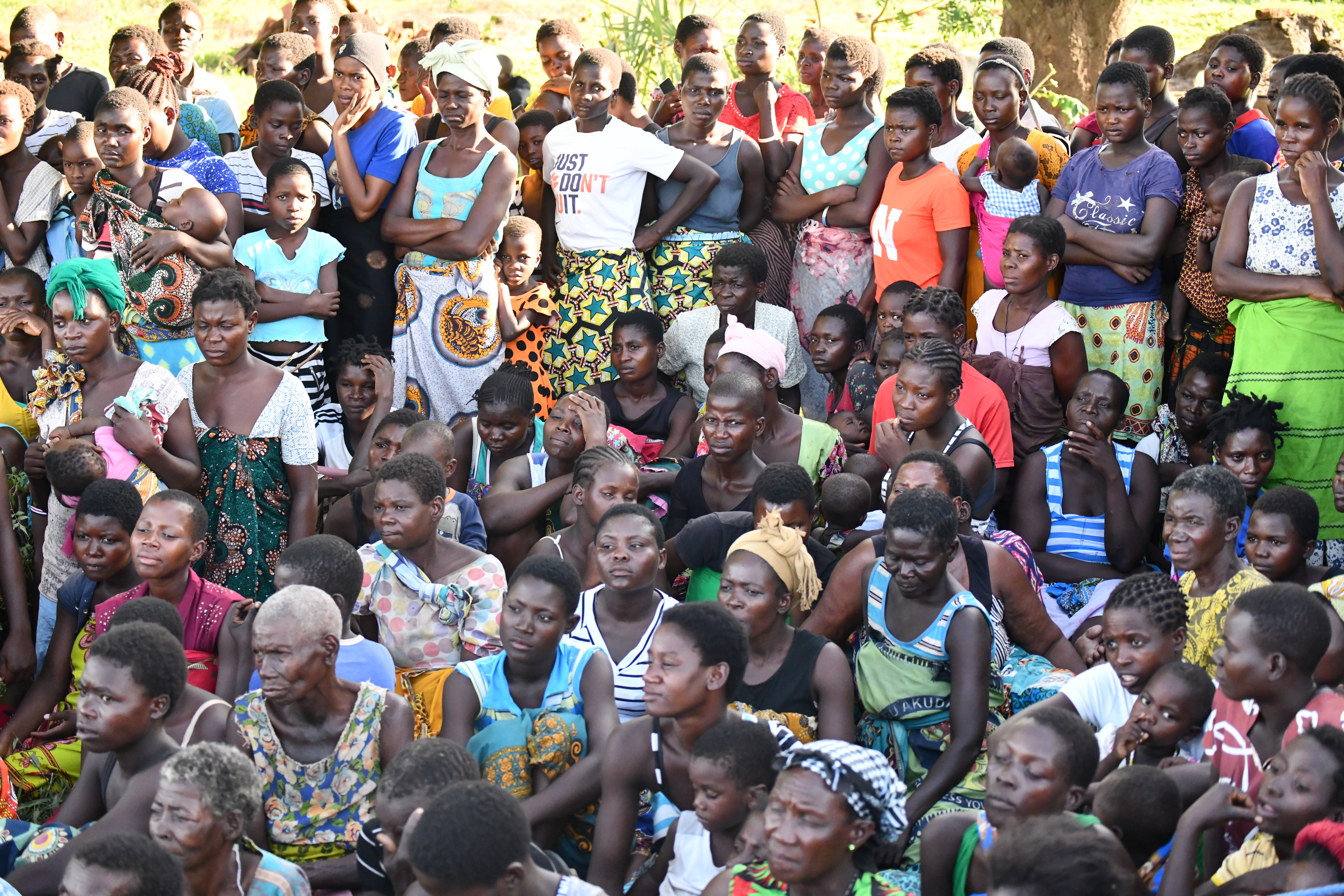 Community members at Gambatula Camp learning about types of gender-based violence and prevention. Photo: UN Women Malawi. 