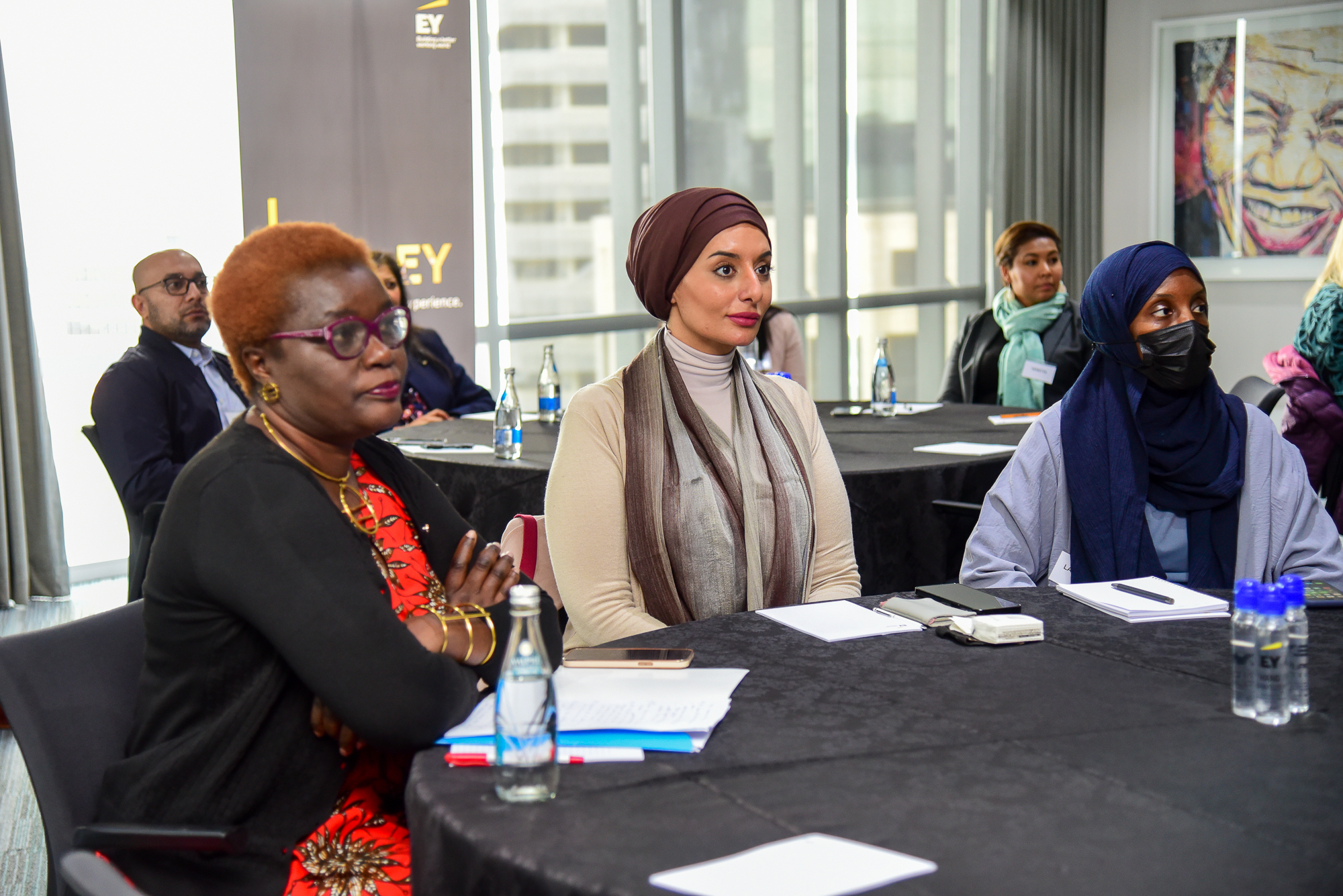 (From left) Dr. Jemimah Njuki, H.E Reem bin Karam and Lawratou Bah listening to presentations at EY offices in Sandton on the second day of the high-level mission (Photo: UN Women/James Ochweri)