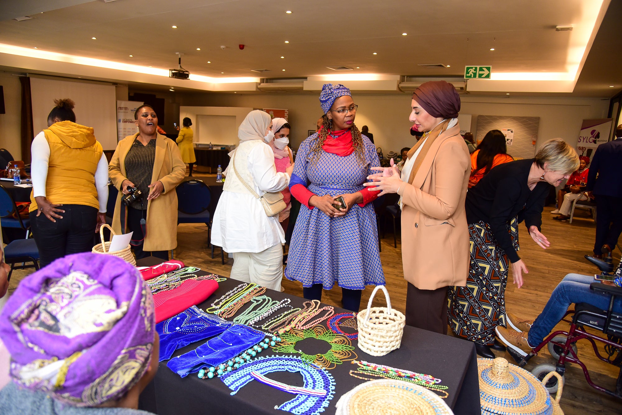 H.E Reem bin Karam interacts with beneficiaries of the flagship programme at a meeting with Amathole District Municipality and other partners in East London (Photo: UN Women/James Ochweri