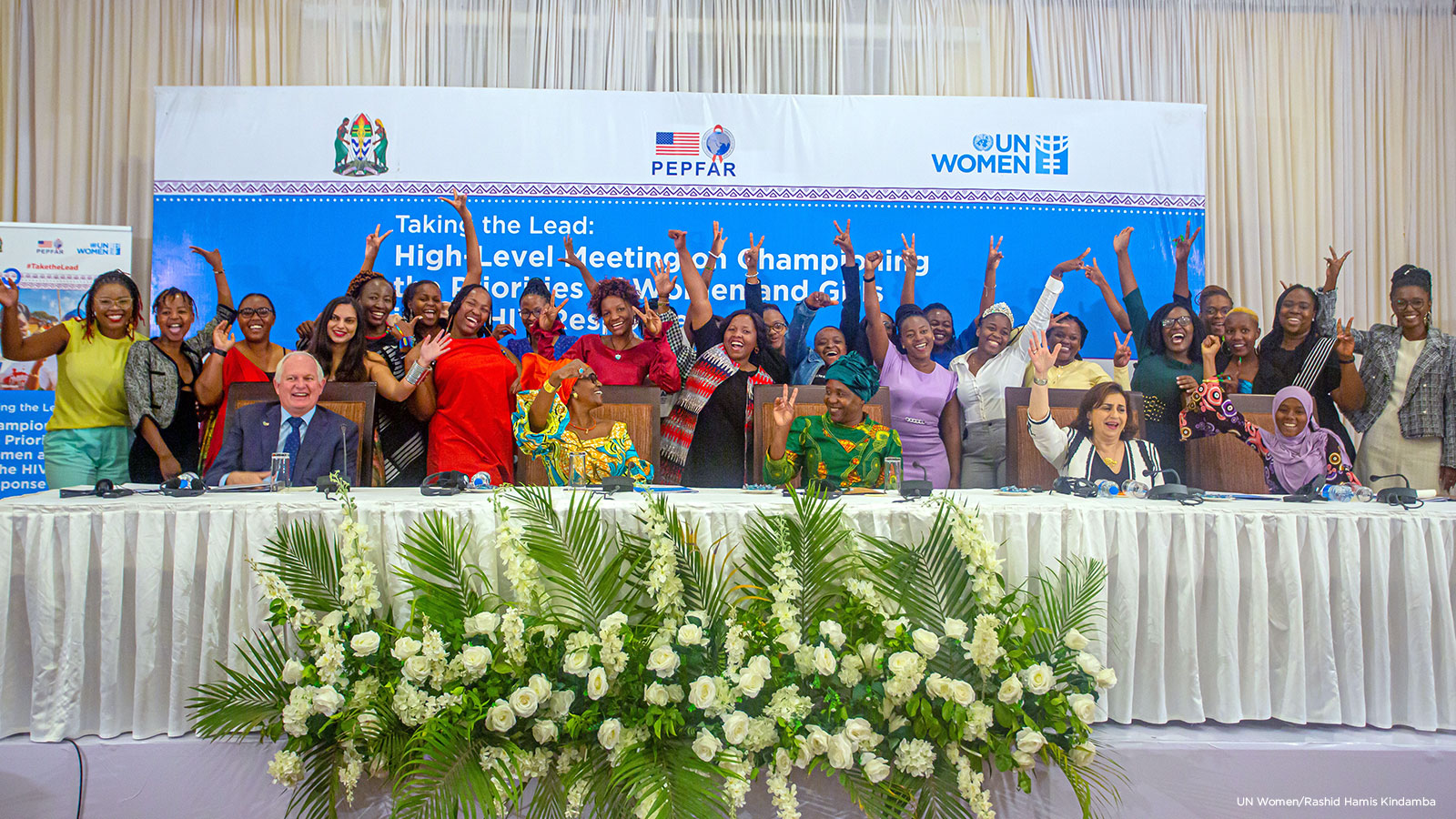 Sima Bahous, UN Women Executive Director;Winnie Byanyima, UNAIDS Executive Director; Dorothy Gwajima, Tanzanian Minister of Health, Community Development, Gender, Elders and Children; and Donald J. Wright, United States Ambassador to Tanzania with emerging young leaders who are participating in a UN Women programme on young women’s leadership in the HIV response. Photo: UN Women/Rashid Hamis Kindamba 