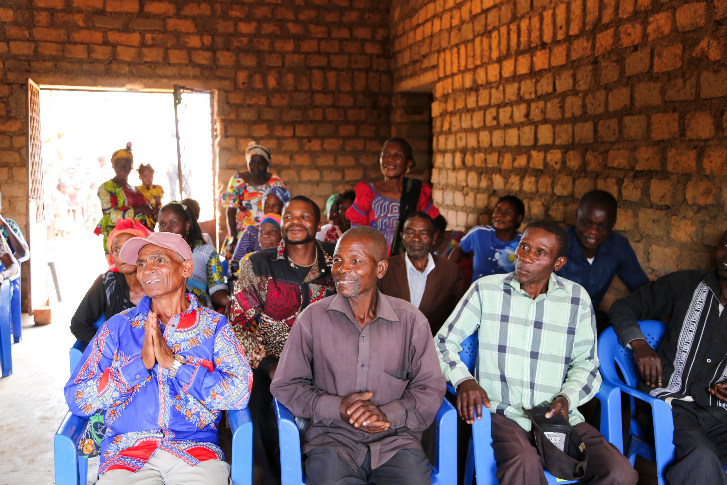 Kapulwa villagers in the assembly room