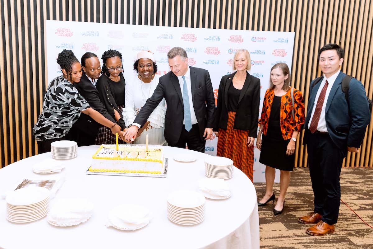 UN Women Representative Ms. Jennet Kem together with key delegates including Minister of Gender and Family Promotion to her left, H.E Ambassador of France Mr. Anfre Antoine to her right and all partners sharing a small cake at the gender dialogue as we mark end of year. Photo: UN Women Rwanda/Next line.