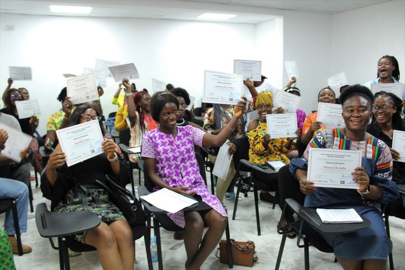 Beneficiaries of the digital training program facilitated by UN Women Liberia in collaboration with Orange Foundation graduate at the Orange Digital Centre in August 2022. Photo credit @UN Women/John Monibah.