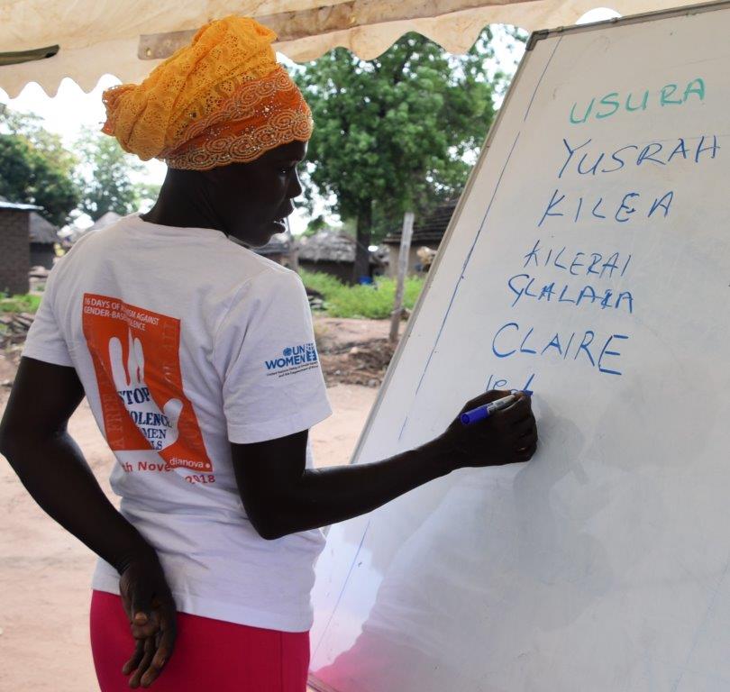 EFA Learner demonstrating her skills in writing different names. Photo credit: UN Women / Aidah Nanyonjo