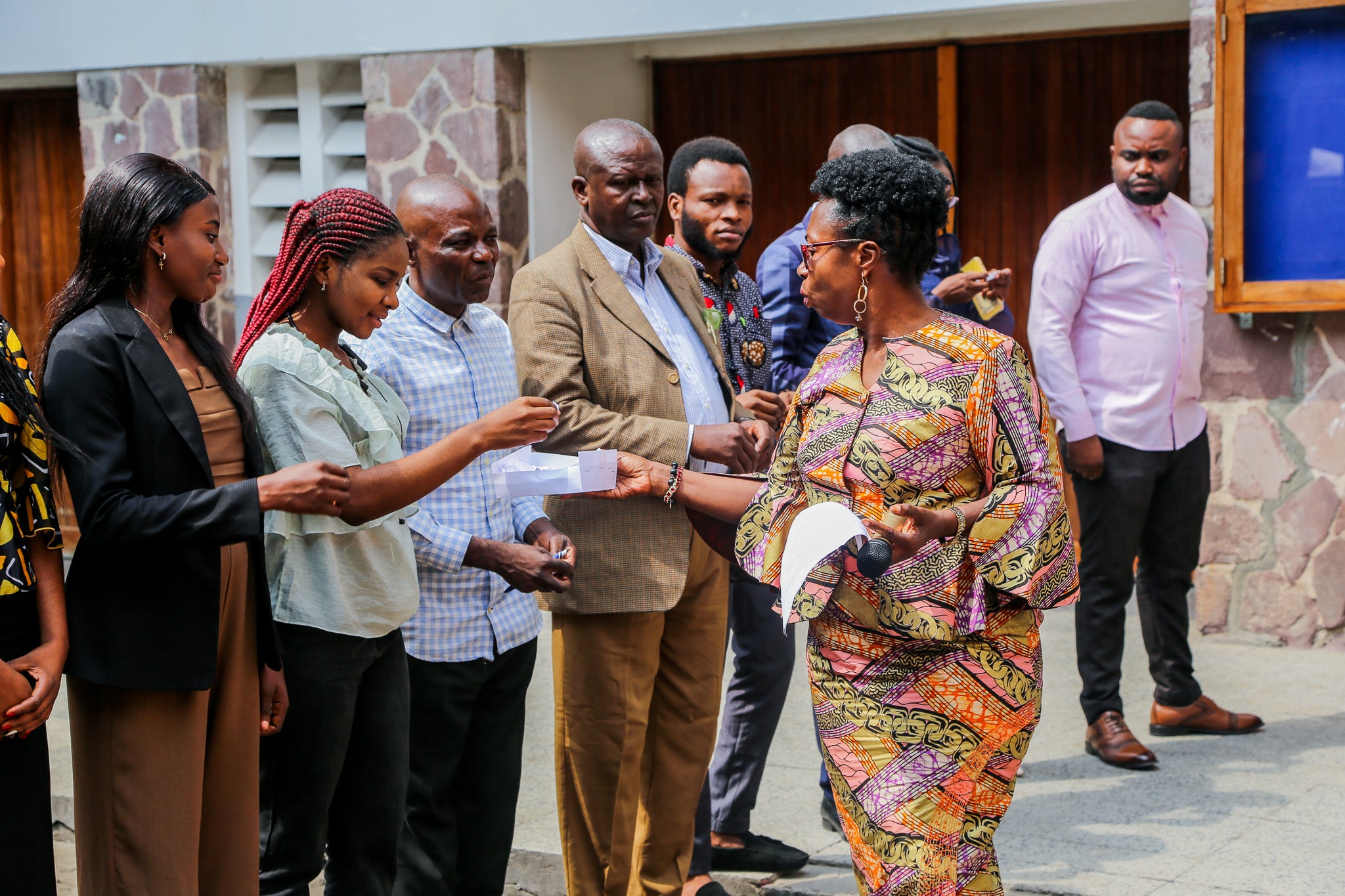 Community radio journalists in Kinshasa participate in a roll-playing activity. Photo: UN Women / Marina Mestres Segarra.