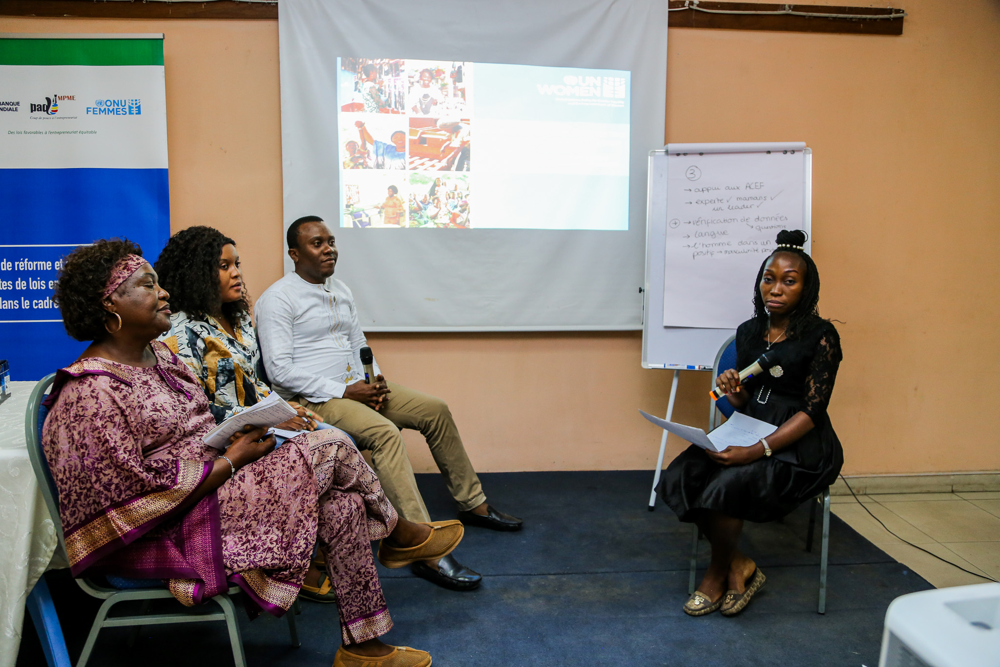 A group of journalists and ACEF members of Matadi perform a simulation of a radio programme on gender stereotypes. Photo: UN Women / Marina Mestres Segarra.