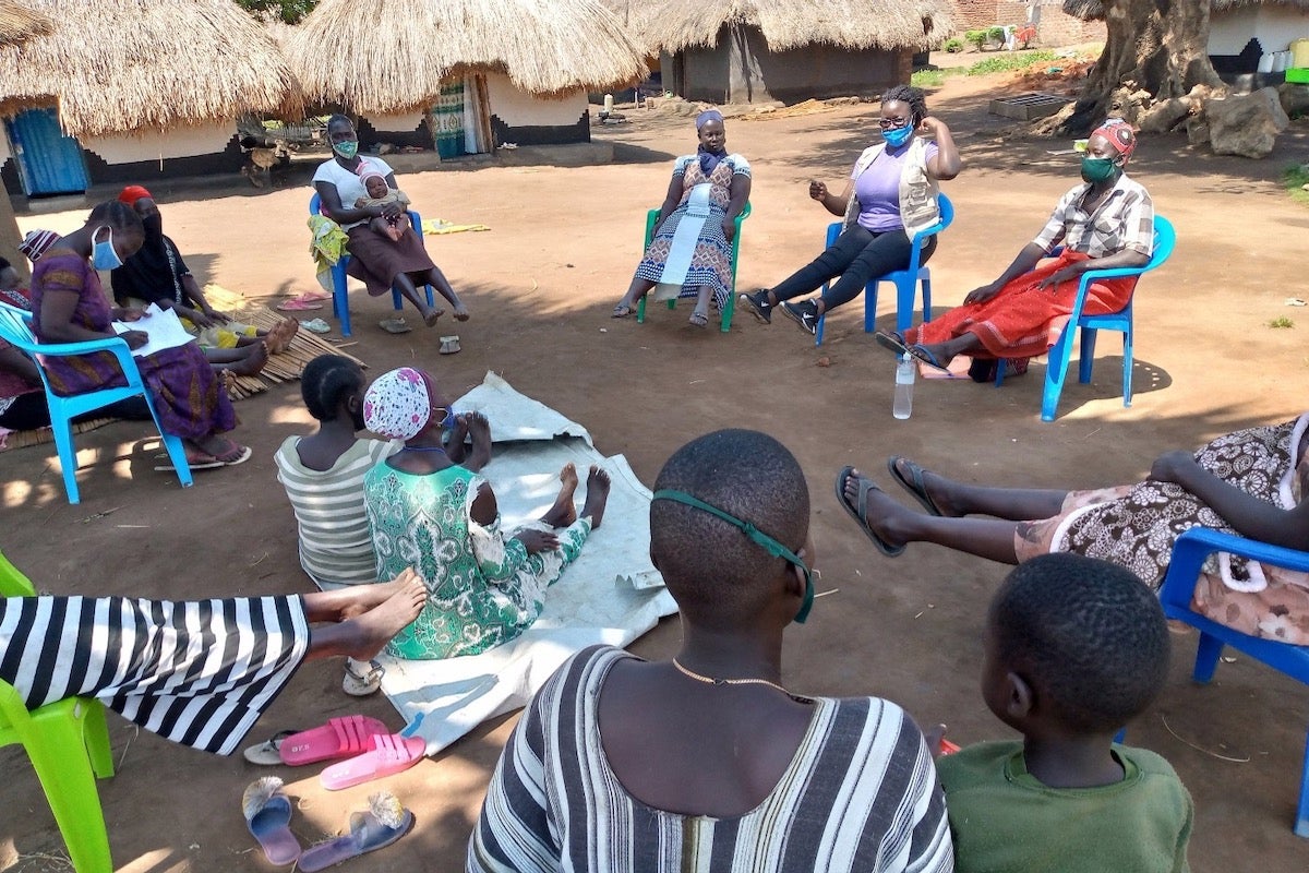 Cognitive Behavioural Therapy (CBT) group members engage in a relaxation exercise during one of their therapy sessions. Photo: Transcultural Psychosocial Organisation