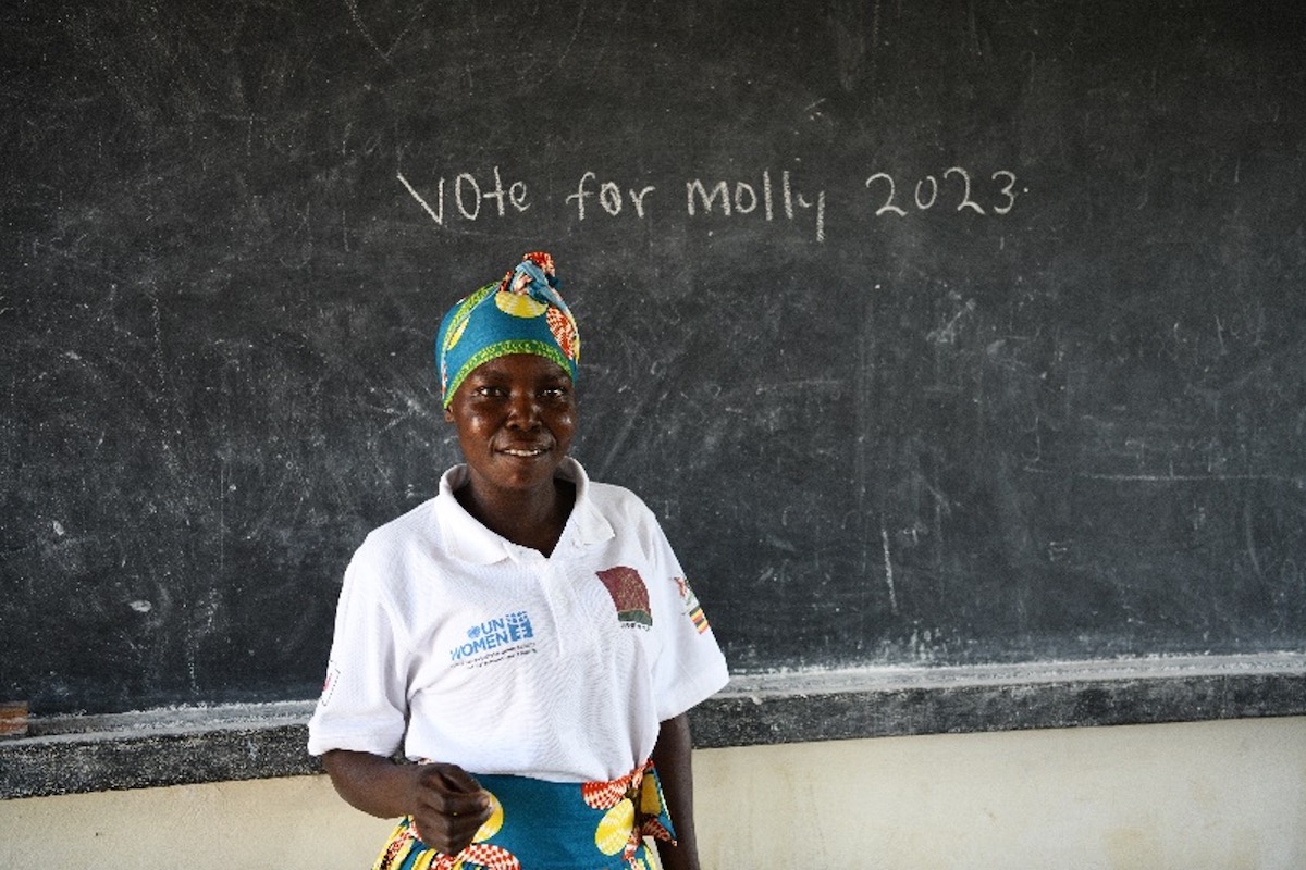 Molly Ajonye demonstrates her English literacy skills after completing the English for Adult Programme. Photo: UN Women/Eva Sibanda