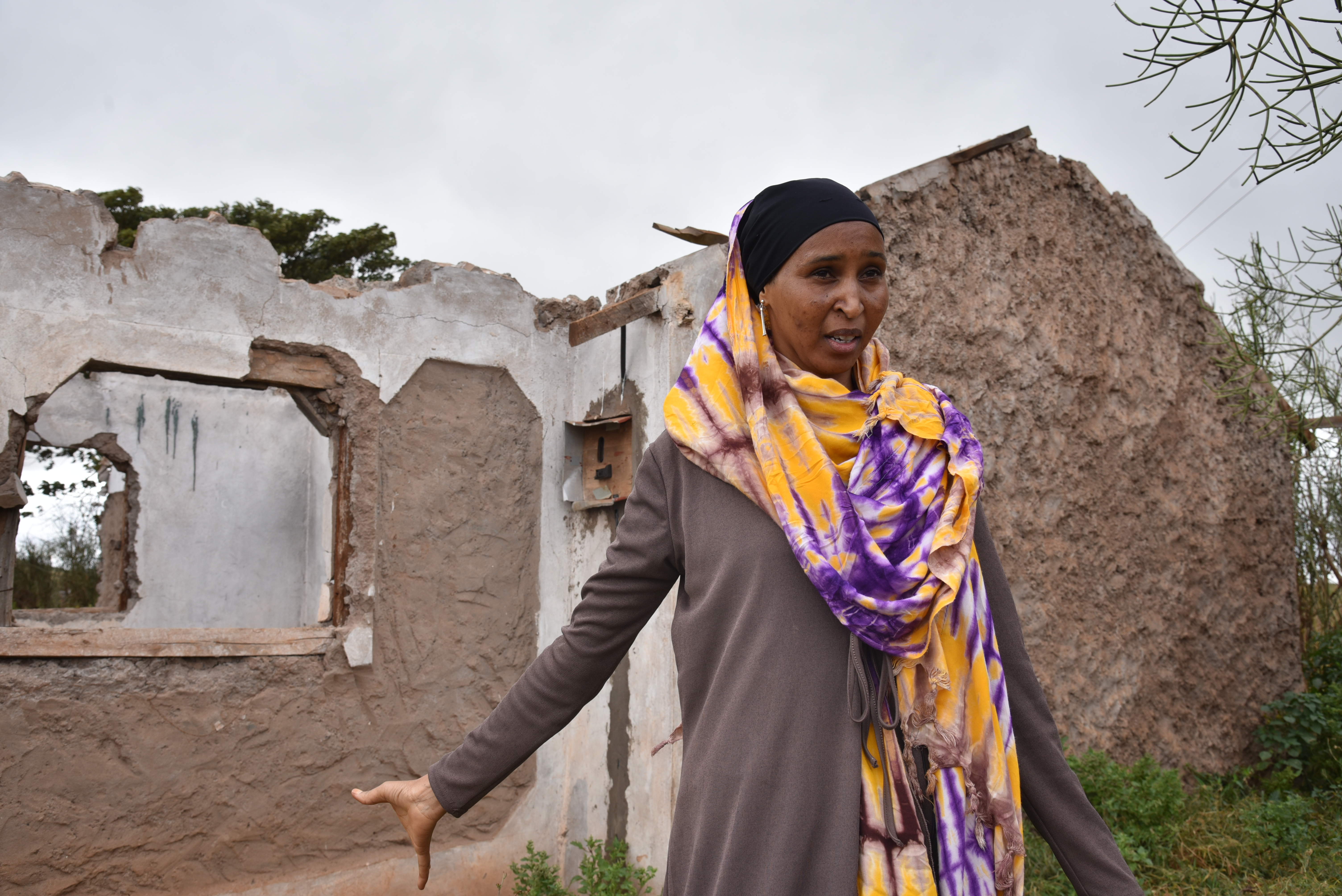 Sori Wario, 36, showing the damage to her community in Marsabit. She was displaced from her home but is now an active voice in its peace and security discussions as a member of the Marsabit Women’s Mediation Network. Photo: UN Women/Luke Horswell