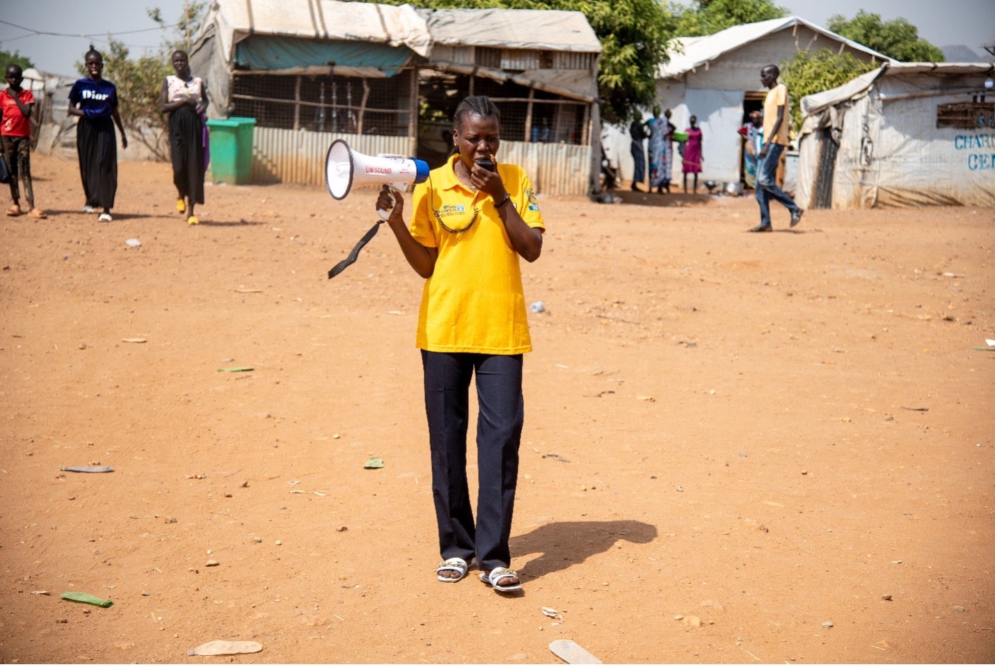 Nyajima John carrying out a community sensitization campaign at an IDP camp outside of Juba, South Sudan (photo: UN Women/James Ochweri) 