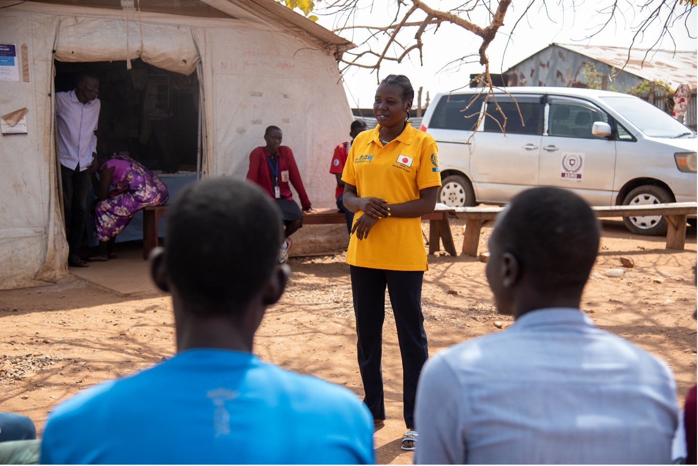 Nyajima John speaking to community members at an IDP camp outside of Juba (Photo: UN Women/James Ochweri) 