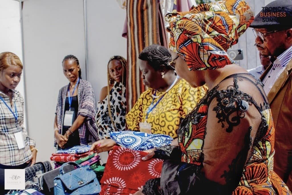 Venicia Guinot presenting the Tropics Textiles Group (made of 100% cotton proudly handmade in Cotonou, Benin) to HE Minister of SMEs and handicrafts of the Republic of Congo at the TROPICS TRADE EXPO in Brazzaville, Congo