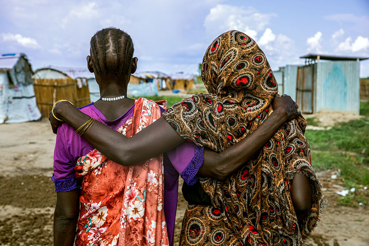 Women are seen at a displaced person's site that helps women in need, including victims of sexual violence, in Bentiu, Sudan. Photo: OCHA/Alioune Ndiaye
