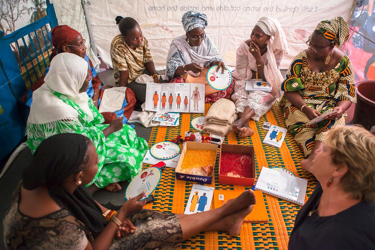 In 2014 in Senegal, government professionals participate in a training of trainers workshop on menstrual hygiene management delivered by a Joint Programme on Gender, Hygiene and Sanitation and designed and implemented by the Water Supply and Sanitation Collaborative Council (WSSCC) and UN Women in West and Central Africa. The training aims to strengthen their capacities in sanitation and hygiene for women and girls in order for them to transform programmes and conduct awareness raising sessions at both the institutional and the community level. Photo: Javier Acebal