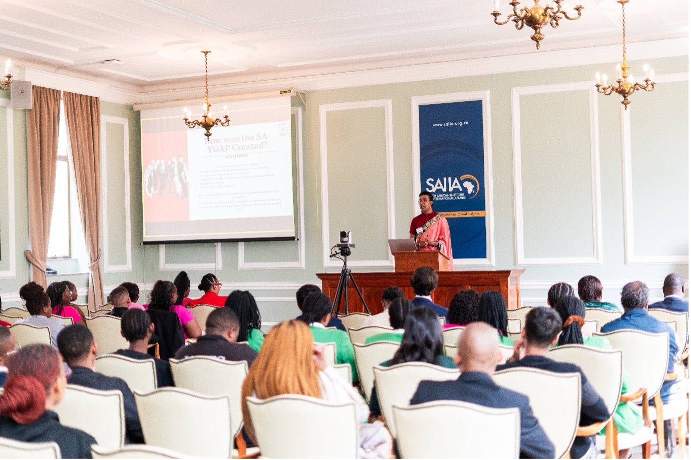 One of our SA YGAP Project Leads presenting on the SA YGAP during launch day, with representative from UN Women, the government, civil society and other stakeholders present. Photo courtesy of Cyril Zuma.