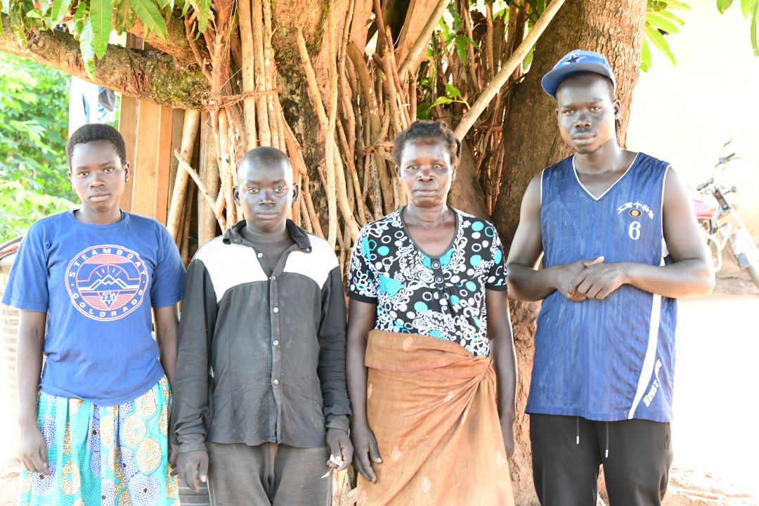 Laker in a group photo with her three of the four children