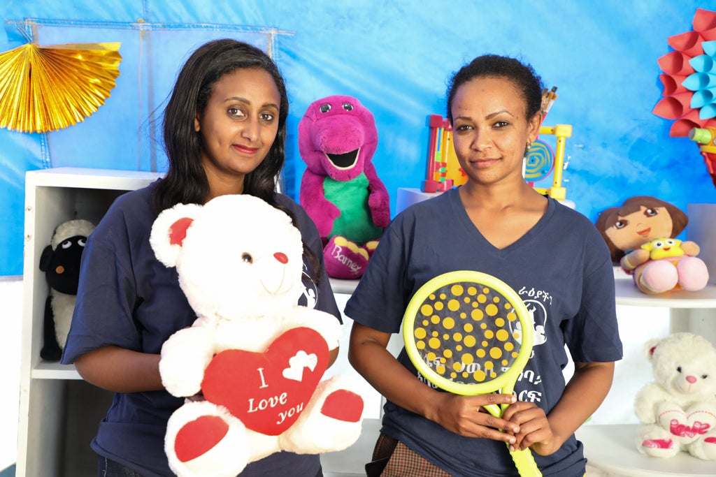 Photo: Mieraf Debrework (right) and Ribka Getachew (left), counsellors at a shelter for survivors of GBV, inside a makeshift counselling tent they use to counsel children in the safe house run by AWSAD, a UN Women partner in Ethiopia. Photo: UN Women/James Ochweri