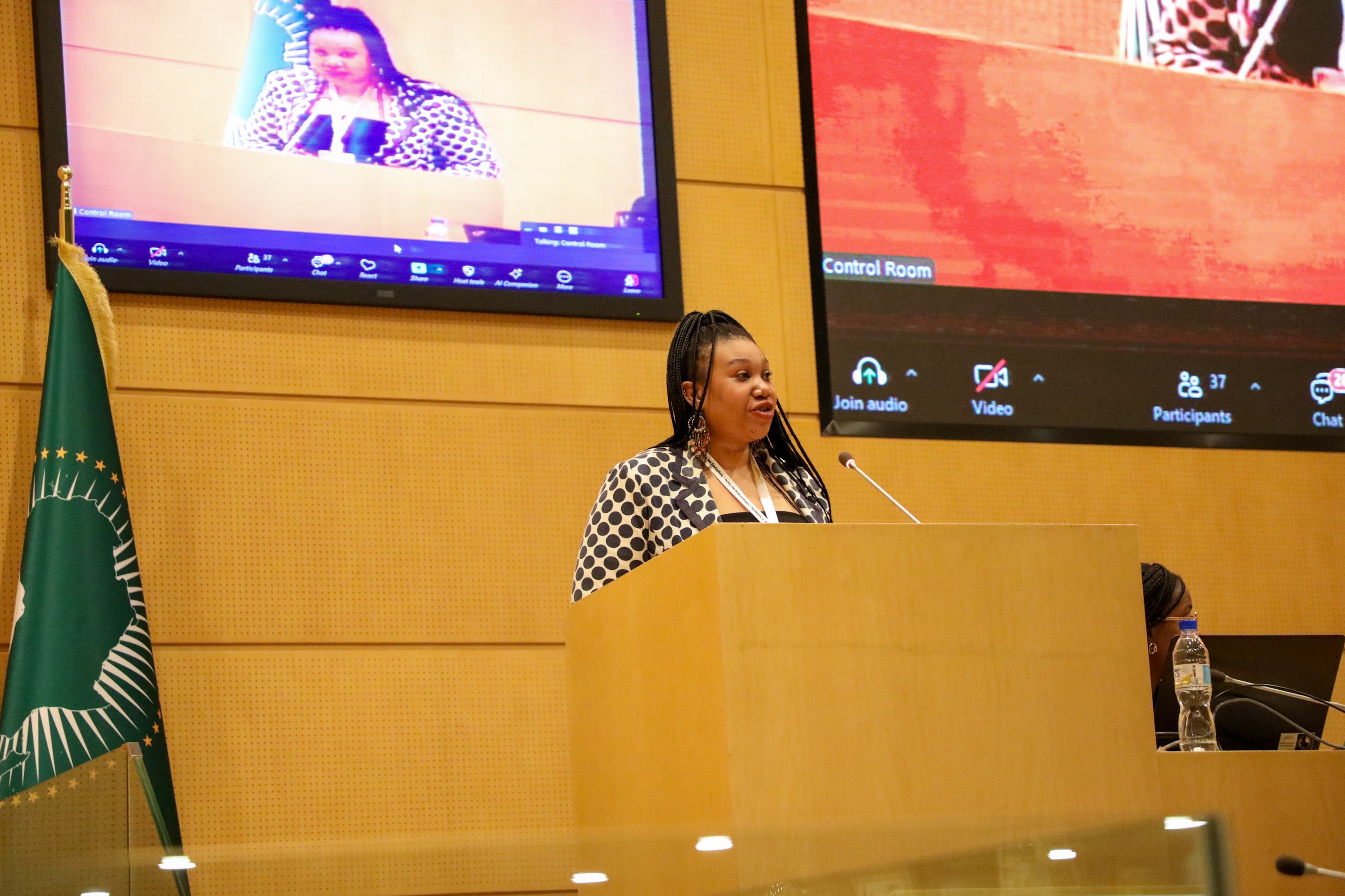 A representative of the African youth presents their position statement at the opening session of the Africa Union Ministerial Consultative Meeting on Pre-CSW69 and Beijing+30 review. (Photo: UN Women/James Ochweri)