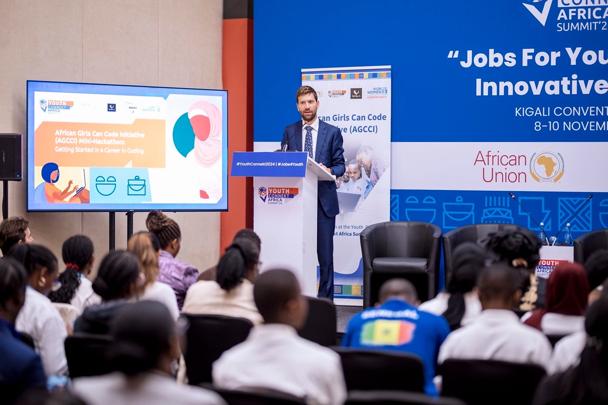 Mr. Laurent Preud’homme, Deputy Head of Mission and Head of Cooperation at the Belgian Embassy in Rwanda, delivering keynote remarks at the AGCCI Mini-Hackathon