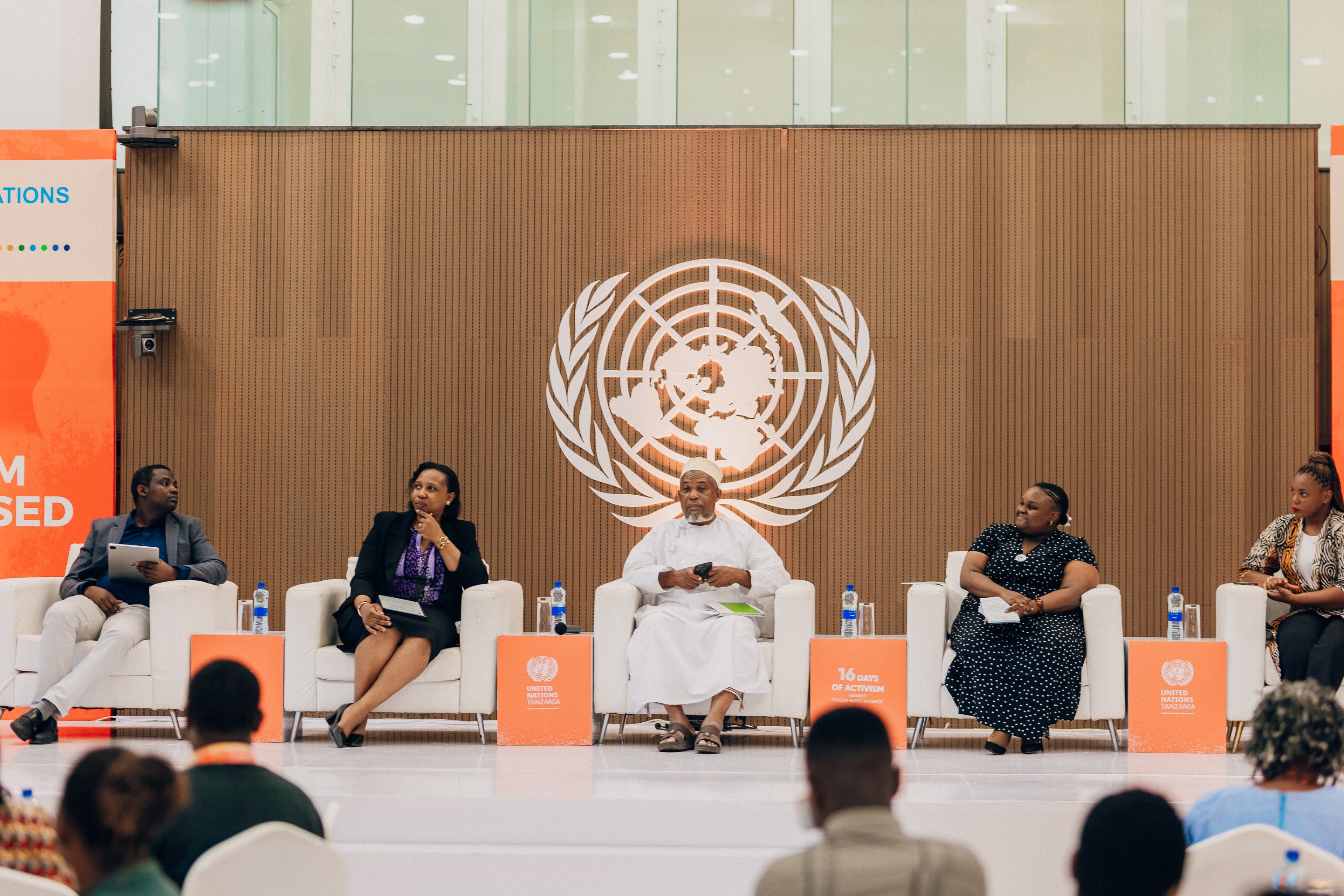 Panelists -  NPA-VAWC Coordinator, Mr. Alex Shayo; Judge of the High Court and member of the Tanzania Women Judges Association, Hon. Dr. Theodora Mwenegoha; Ms. Florah Ndaba, TGNP Head of Programme Activism and Movement Building; and Artist, Ms. Lilian Munuo. Photo: UN Women