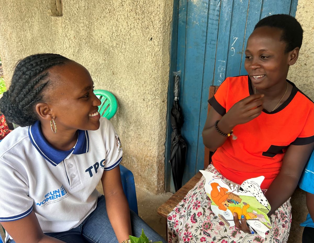 Grace talking to a TPO staff member in an interview