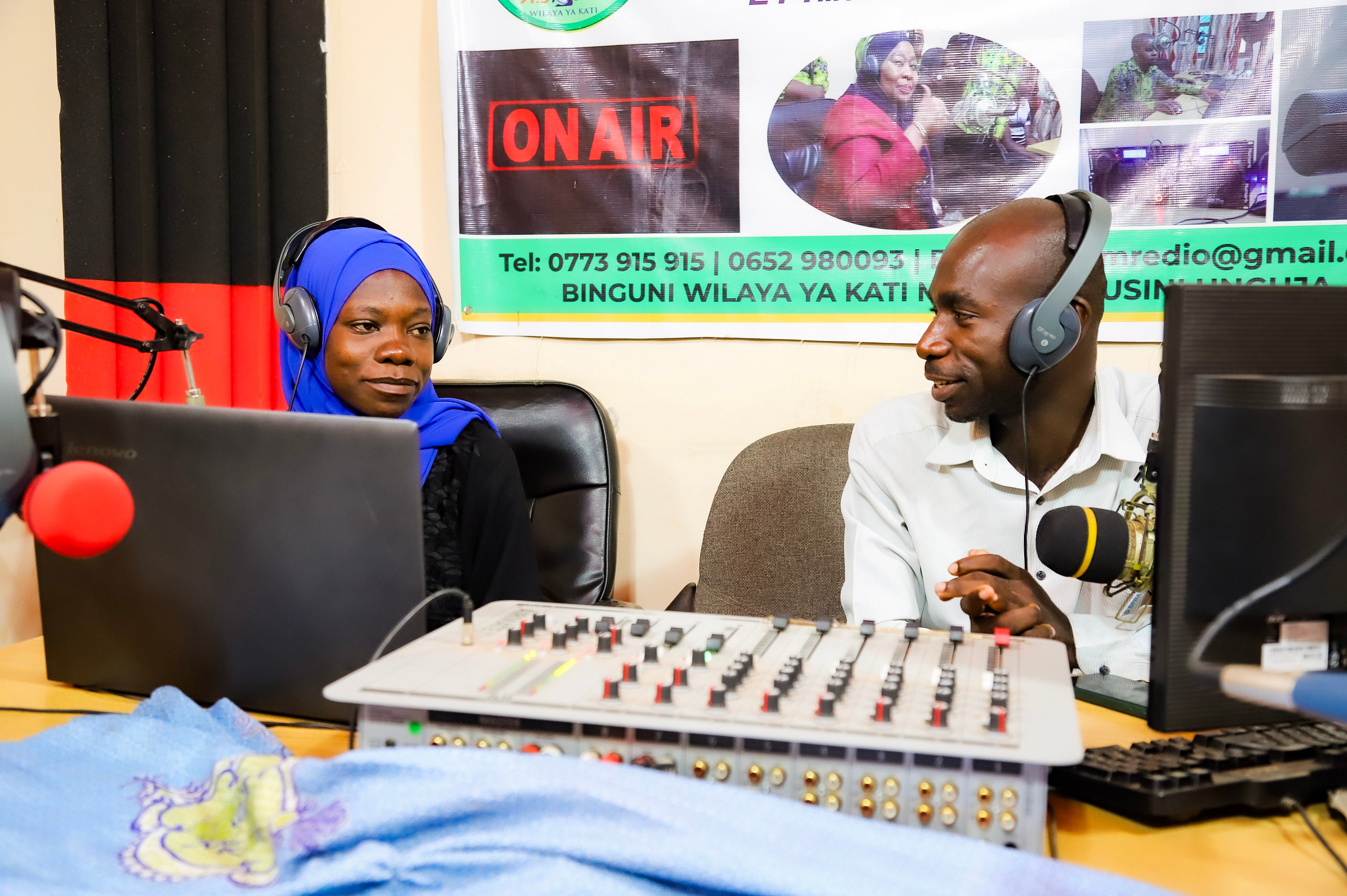 Amina Mohamed and Hassan Vuai Saburi, community radio presenters for the youth-led Kati Radio station in their studio in Zanzibar. 