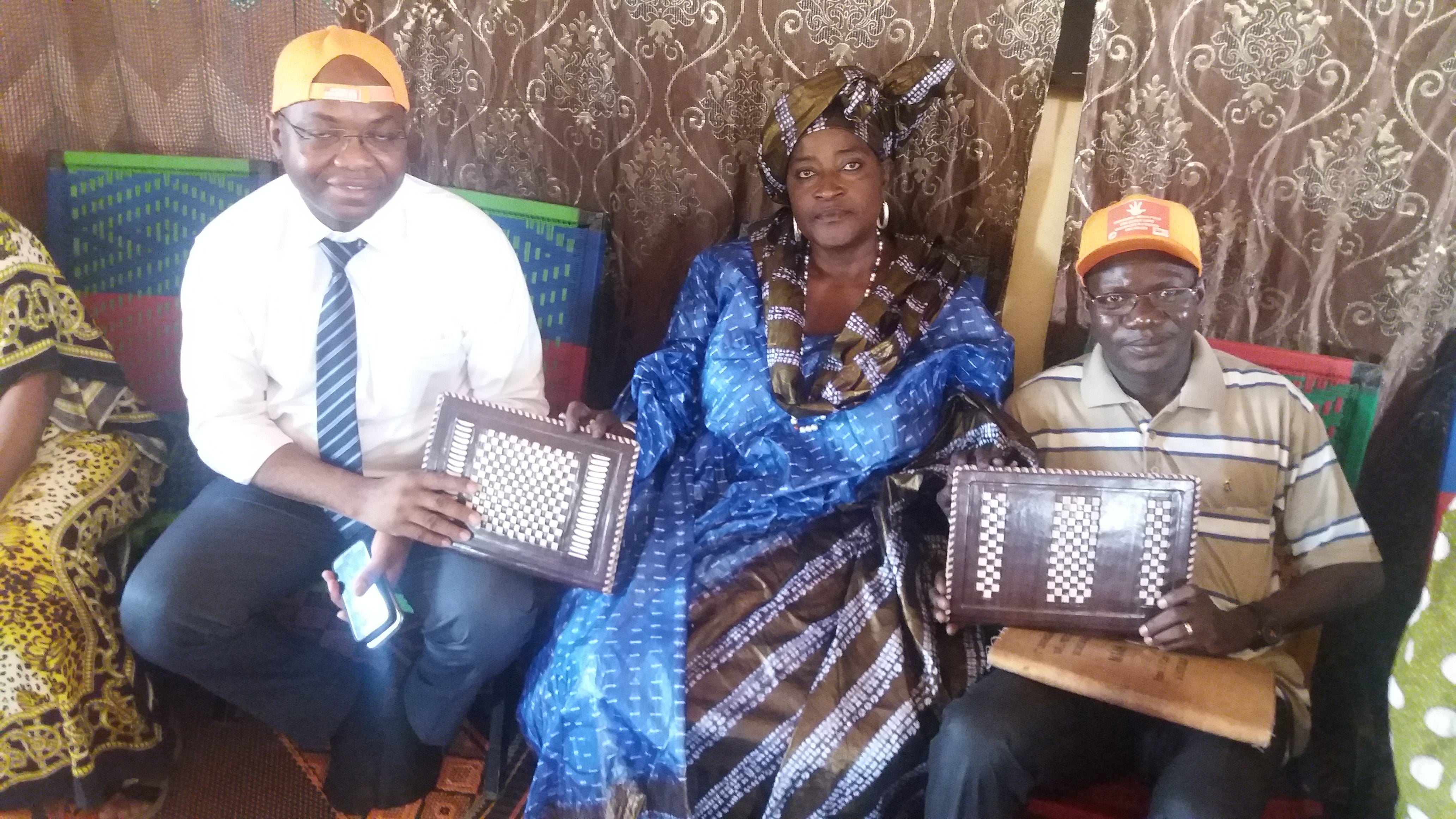 The President with Maxime Houinato, Representative of UN Women Mali (left) and Désiré Ballo, Embassy of Sweden (right)