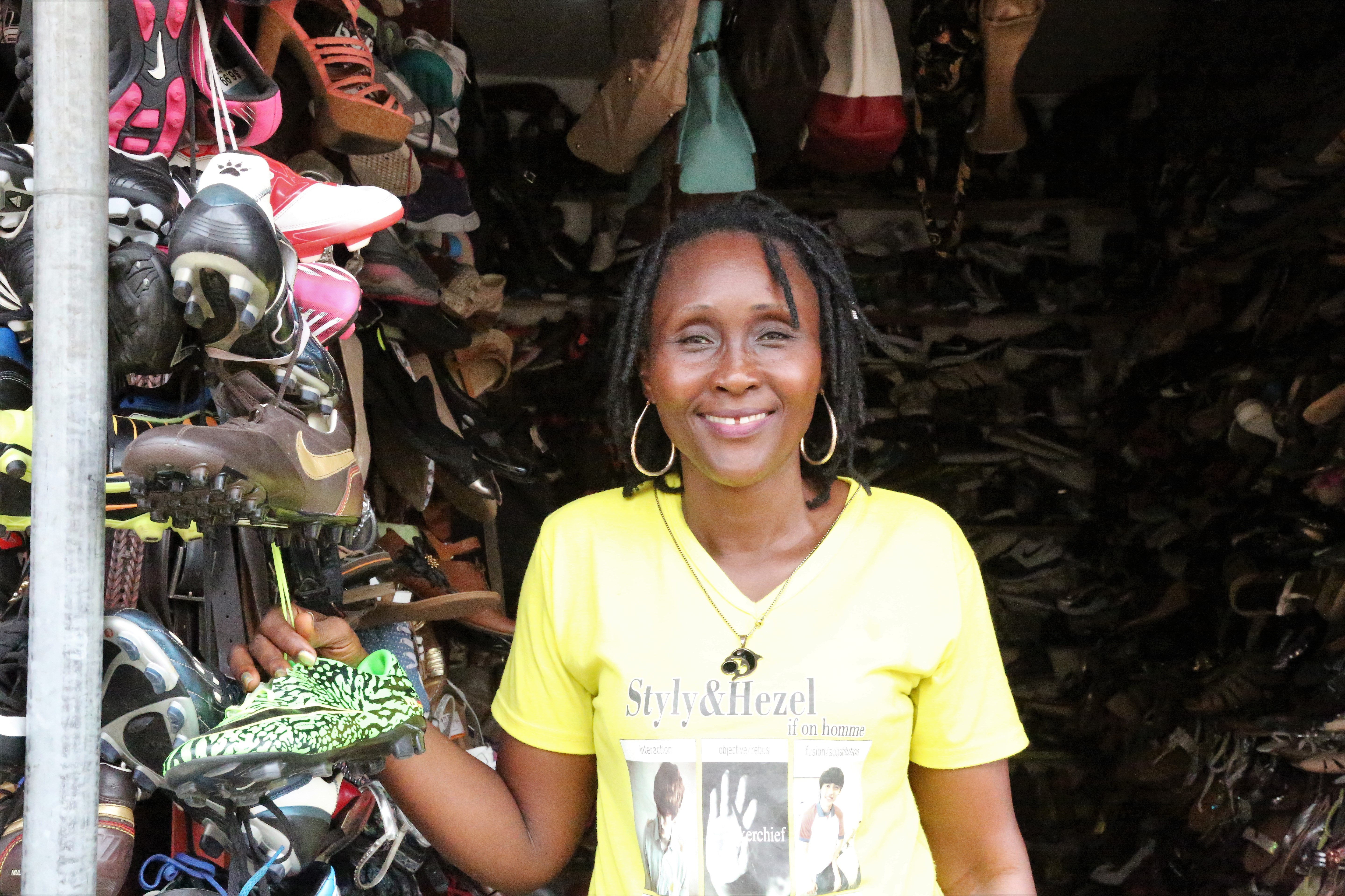 Catherine is one of thousands of beneficiaries of the 'Next Level' Business Development Skills Training Programme. Her story of success is helping inspire her fellow market-women in Ma Juah Market in Monrovia. Photo: UN Women/Winston Daryoue