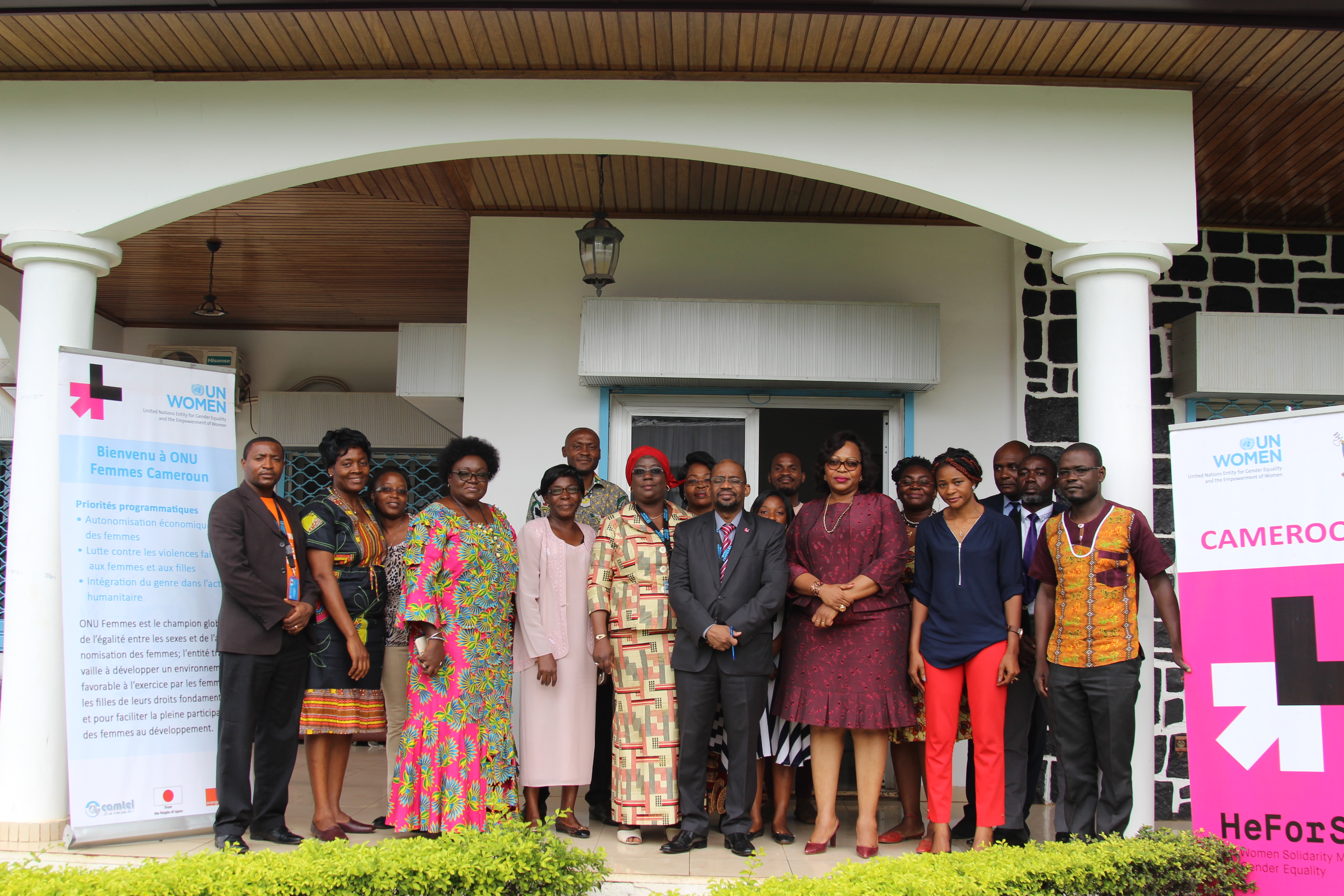 Participants pose for family photo during the sensitization workshop on integrating menstrual hygine management needs of women in ongoing policy reforms organized by UN Women. Photo credit; Teclaire Same, UN Women.