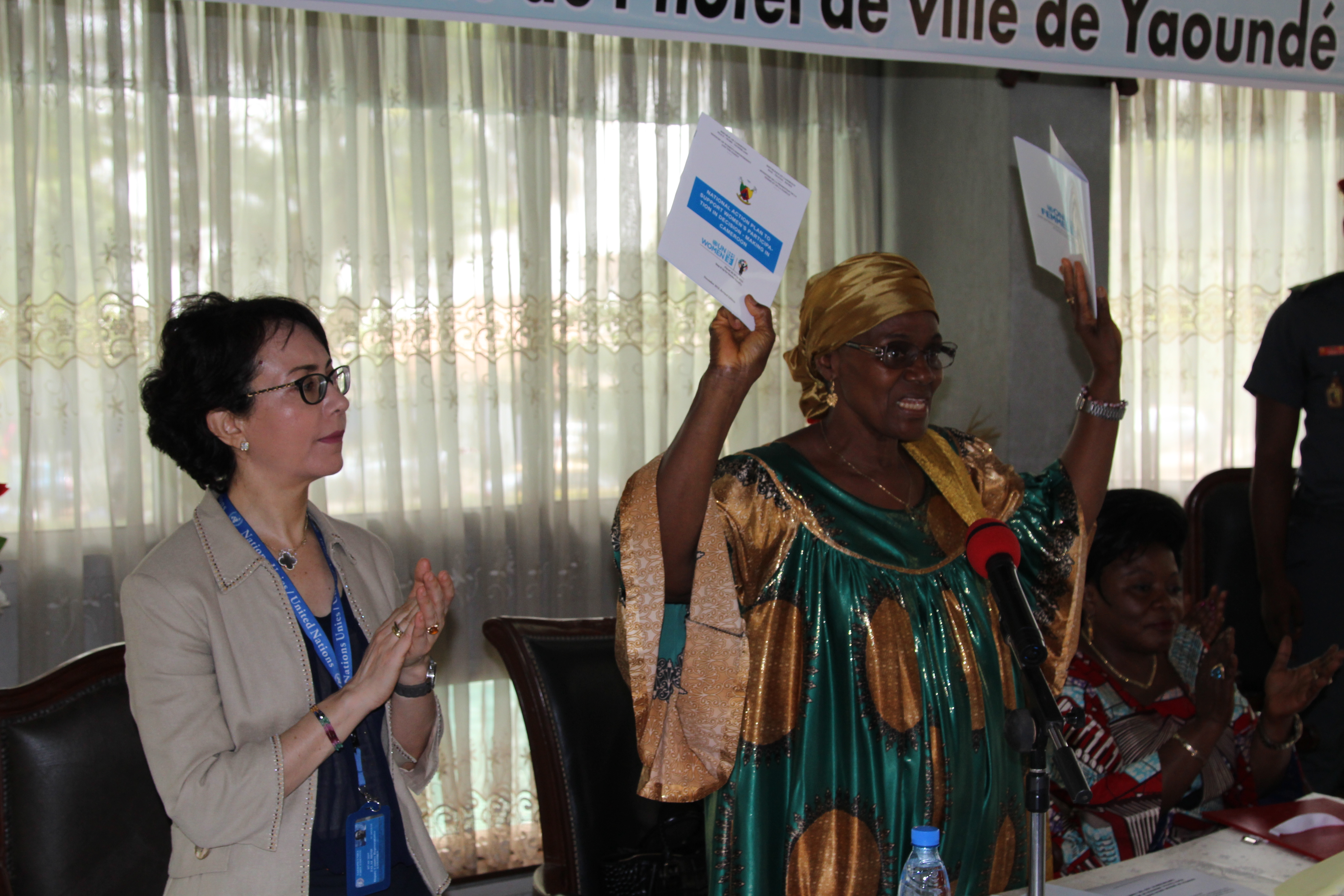 Minister Abena Ondoa Marie-Therese, MINPROFF, officially presenting the political education manual and national action plan to support women’s participation in decision making. Photo credit: Teclaire Same, UN Women.