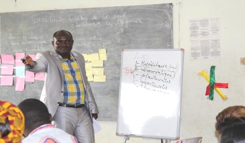    Trainer from Ministry of youth during his presentation. Photo credit: Emeline Evina/HeForShe Volunteer/UN Women  Cameroon
