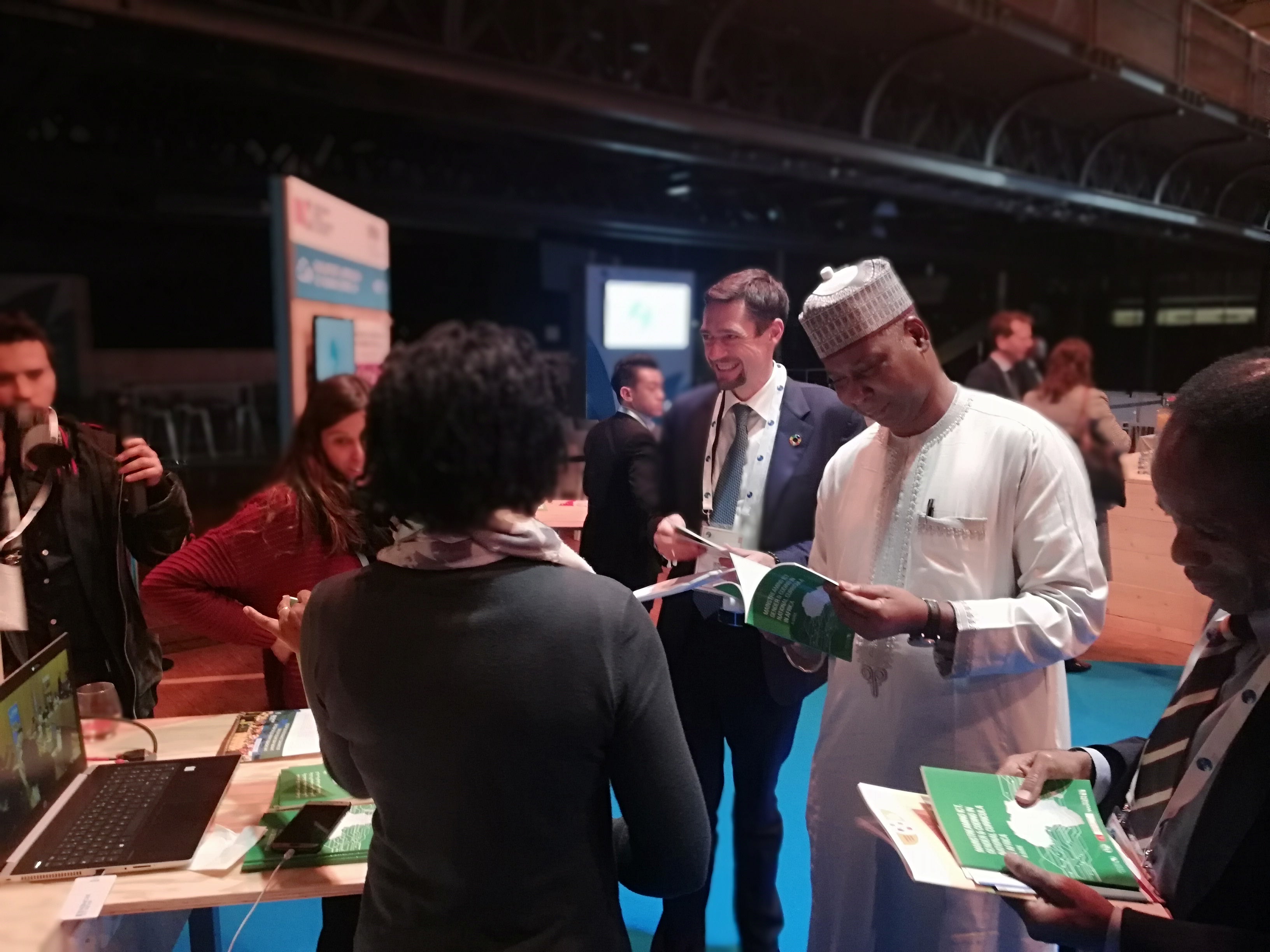 Tijjani Muhammad-Bande: President of the United Nations  General Assembly at the AGCCI booth © UN Women