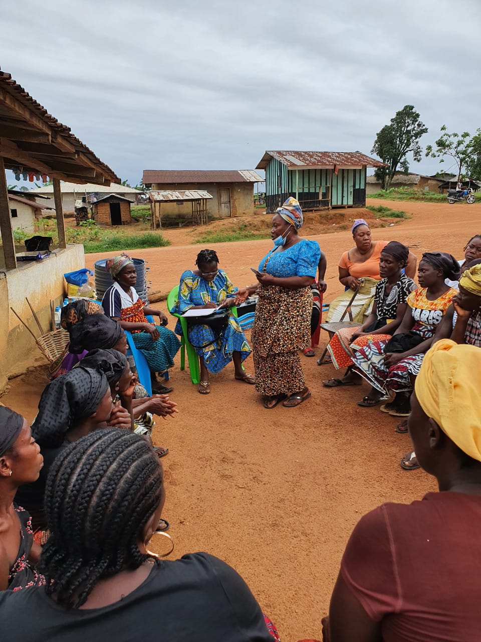 Mrs. Kebeh Monger, National President of the Rural Women Structure of Liberia addresses women during a COVID-19 awareness campaign