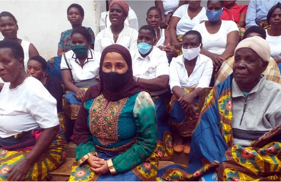 Councillor Munira joins a women’s group in a visit to the elderly of the Likangala ward to give them psycho-social and material support.