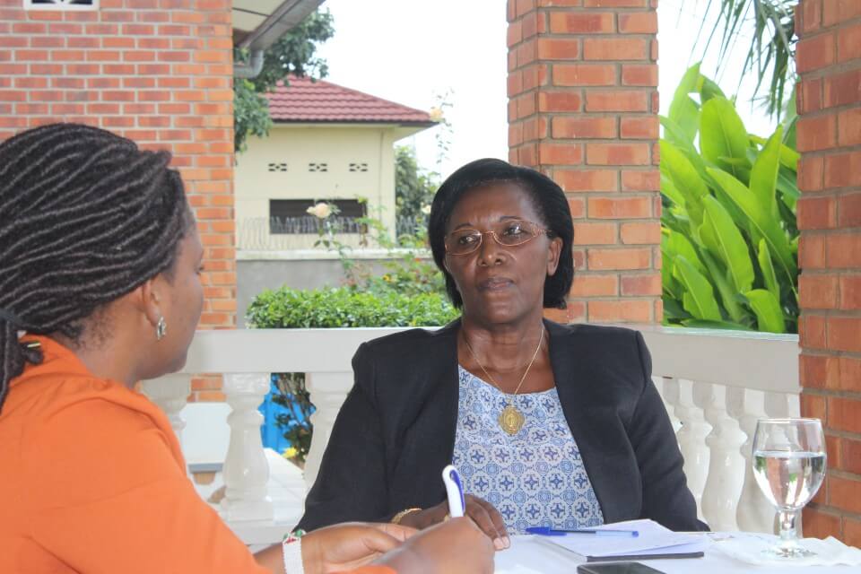 Marguerite Bukuru (centre), discussing with Marleine Kubwayo about the rights of Burundian women before and after the Beijing Conference in 1995. Photo: Odette Kwizera/UN Women Burundi