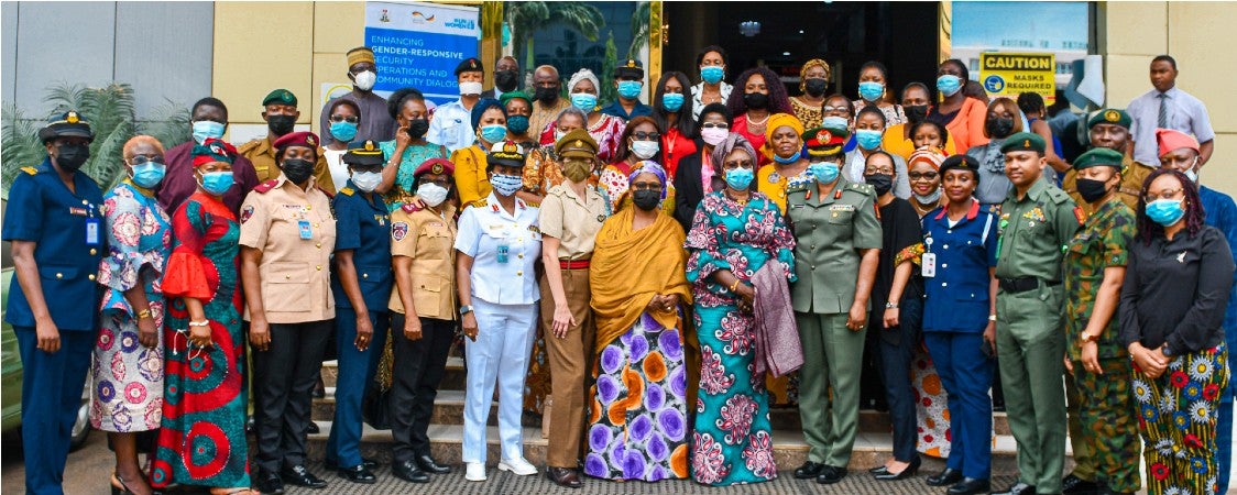 Participants honour the national anthem of Nigeria. Photo: UN Women/ Olanrewaju Faremi