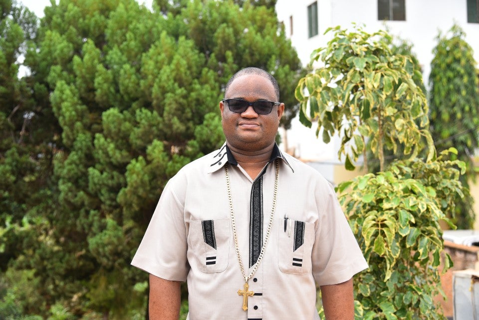 Bishop Peter Mwero, 40, has been a bishop for 3 years, serving his community across Kenya’s coastal region. He has spent over 10 years operating church-led development programmes and facilitates local dialogues. Photo: UN Women/Luke Horswell