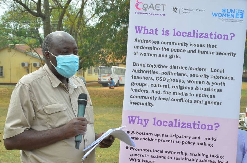 Mr. Masereka Amis Asuman, the Chief Administrative Officer, Kasese, District speaking during the launch of the Kasese LAP. 