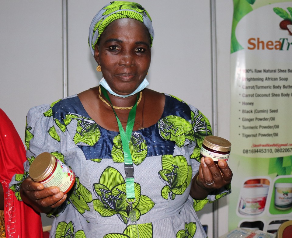 Jummai Shekarau of Anty J entreprises (Niger State) displays her products during the 2nd National Shea Butter Expo in Abuja. Photo: UN Women/ Faith Bwibo