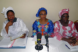 (Left to right) Soyata Maiga, Saran Keïta Diakité, President of women’s peace and security network REPSFECO/Mali, and Diarra Afoussatou Thiero attend a UN Women training session on mediation prior to attending peace negotiations in Ouagadougou in April 2012.