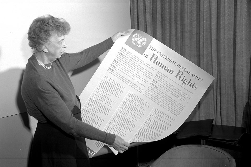Eleanor Roosevelt of the United States holding a poster of the Universal Declaration of Human Rights. Lake Success, NY, November 1949. UN Photo