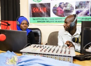 Amina Mohamed and Hassan Vuai Saburi, community radio presenters for the youth-led Kati Radio station in their studio in Zanzibar. 