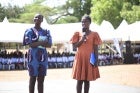 Gloria speaks to hundreds of students during the youth summit